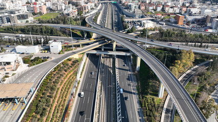 Aerial drone photo of modern Attiki Odos toll road interchange with National road in Attica,...