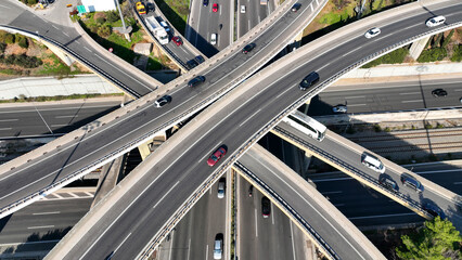 Aerial drone photo of modern Attiki Odos toll road interchange with National road in Attica,...