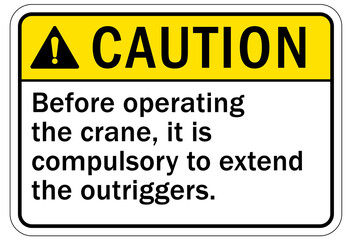 Obraz premium Overhead crane hazard sign and labels before operating crane, it is compulsory to extend the outriggers