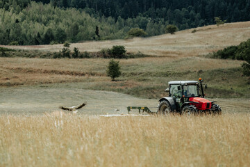 Tractor and white stork