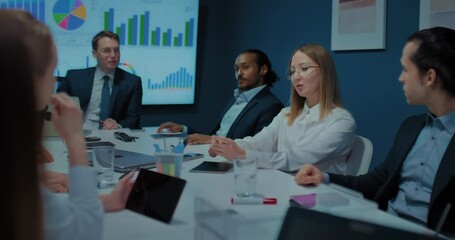 team of multiethnic business experts discussing working tasks in meeting, diverse people, 4K, Prores