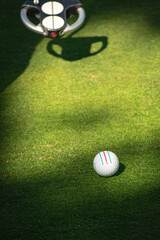 golf, ball, grass, green, sport, course, hole, golfing, game, golf ball, leisure, putting, club, play, outdoor, golfer, white, recreation, competition, field, sports, lawn, golfball, tee, golf-ball