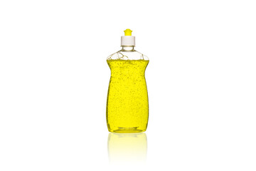 Bottle of yellow dish washing liquid with bubbles isolated white background.