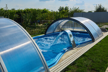 swimming pool with view of the garden