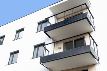 Luxurious apartments for sale. Bricks and concrete. Construction site background. High block of flats living area. New building neighborhood in progress. Real estate market in Europe.