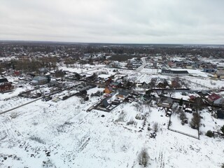 A frame house from a quadrocopter in winter