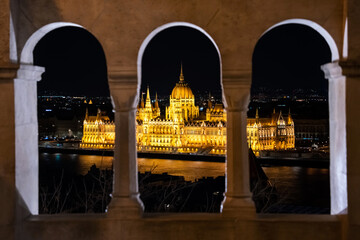 Night time view of the illuminated Hungarian Parliament Building from the Fisherman's Bastion in Budapest, Hungary.
