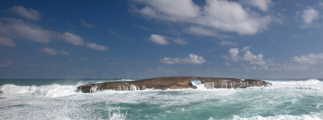 Island storm waves crashing into Laie Point coastline at Kaawa on the North Shore of Oahu Hawaii United States