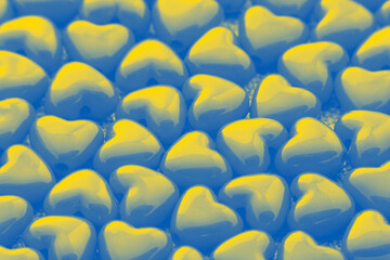 heart shaped beads colored in colors of Ukrainian flag