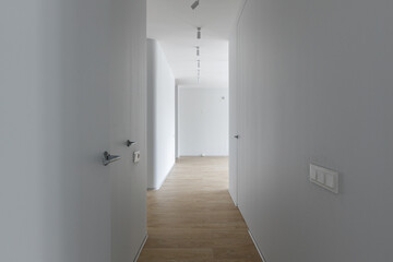 Empty gray room ready for people to move in