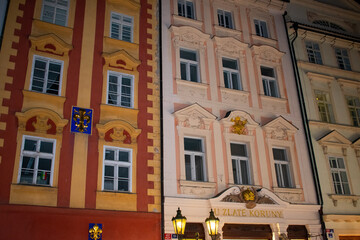Fototapeta na wymiar Colourful facade of buildings in Prague, Czech Republic. Red, Green, Blue Houses in Town 