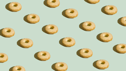 .Pattern of tea rings and cookies, pattern on a mint green background