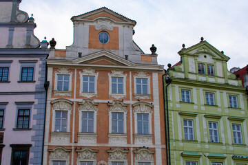 Fototapeta na wymiar Colourful facade of buildings in Prague, Czech Republic. Red, Green, Blue Houses in Town 