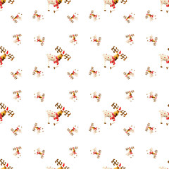 Christmas pattern made with a christmas deer on a white background