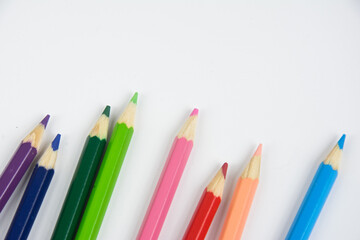 Group of crayons upon a white background