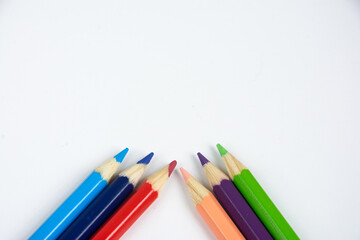 Group of crayons upon a white background