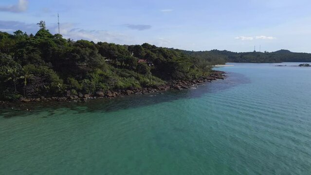 headland rocky beach undulating island. Magic aerial view flight drone