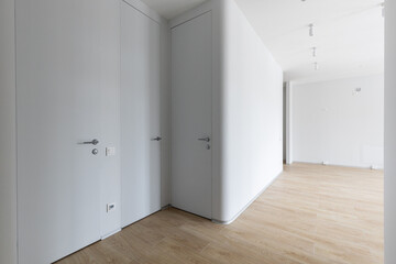 Empty gray room ready for people to move in