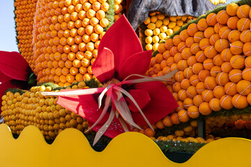 Menton, France-February 12, 2023:traditional carnival parade of Lemon Festival flowers from foamiran