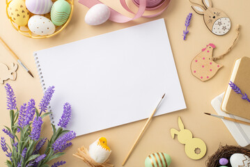 Easter concept. Top view photo of sketchbook brushes colorful easter eggs in bowl wooden decor ribbon chicken nest and lavender flowers on isolated beige background with empty space