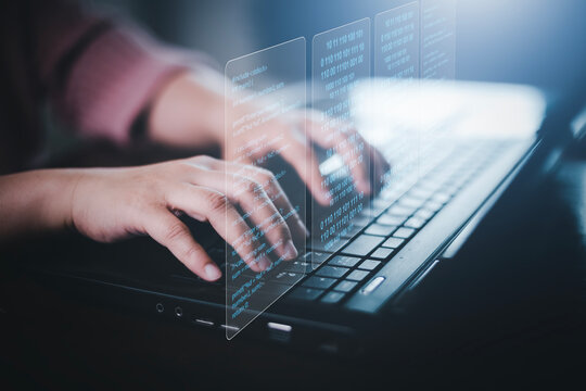Businessman hand touch with Code html and programming on screen laptop,Programmer development Computer code,web design  coding technology in software, digital software technology development, IoT