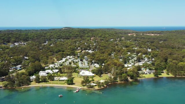 Resort tourism destination on Lake Macquarie Murrays beach lakeshore as 4k.
