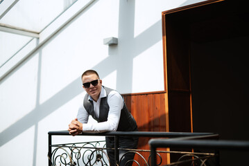 portrait of the groom of a man in the morning before the wedding
