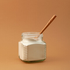 Citrus Pectin extract or Pectin powder in glass jar. Gelling agent used to control water in products and help to create the desired texture. Food additive E440