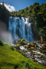 Fototapeta na wymiar Summer time at Marokopa Falls, Waikato District, New Zealand