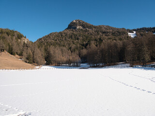 On the snow by the river and on the runway.
