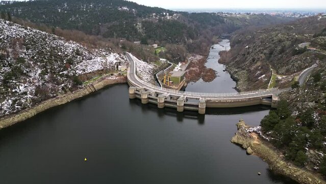 Panoramic drone view of The Grangent dam on the Loire river. Built between 1955 and 1957. Is located downstream of Aurec sur Loire in the surroundings of Saint-Etienne.