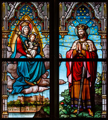 Fototapeta premium Stained-glass window depicting the Virgin Mary with the Infant Jesus and King St Stephen I. (of Hungary) in the Cathedral of St Elizabeth in Košice, Slovakia. 2019/07/05.