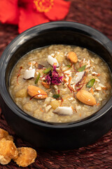 Gur Ki Kheer Also Called Jaggery Rice Pudding, Nolen Gurer Payesh, Rasiyav, Gud Wali Chawal Ki Khir, Rasiya, Ras Bakheer, Rasiyaw, Payasam Made Of Basmati Rice, Milk, Sugar, Jaggery, Gulab JalIn, Ghee