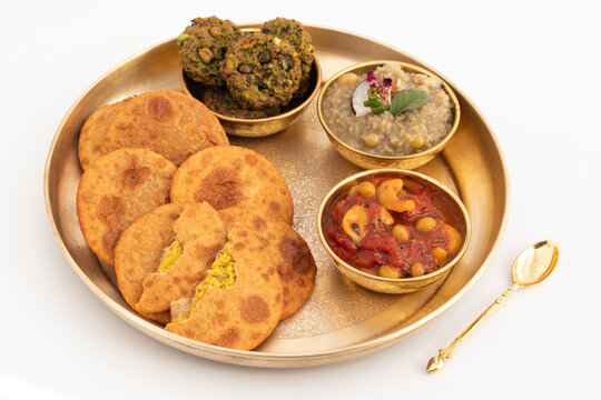 Dal Bhari Poori, Dholl Puri, Cholar Dal, Luchi Served With Gur Ki Kheer Or Jaggery Rice Pudding, Nolen Gurer Payesh, Rasiya, Payasam, Hara Chana Or Chholia Pakoda Bhabhra, Tamatar Ki Meethi Chutney