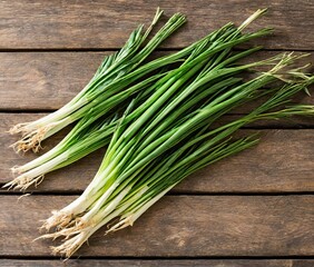 fresh green onion on wooden background