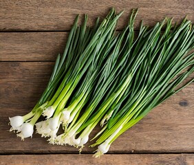 fresh green onion on wooden background