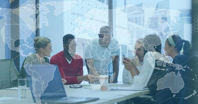 Animation of world map over team of diverse colleagues discussing together at office - Powered by Adobe