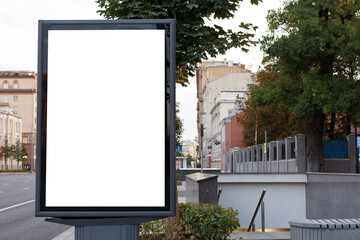 Vertical billboard advertising in the city. Near the underground passage. Mock-up.