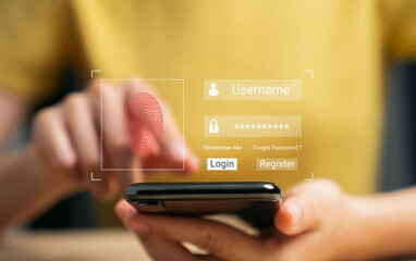 Hand using smartphone and press scan fingerprints your username and password to access the system, login screen, private data and prevent identity.