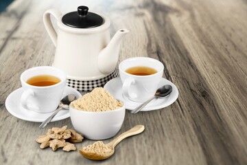 Obraz na płótnie Canvas Cup of hot tasty spicy ginger tea