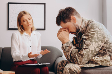 Psychologist working with military officer in office