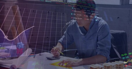 Animation of stock market data processing over asian male architect working on his model at office - Powered by Adobe