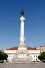 Fototapeta na wymiar The Column of Pedro IV (King Peter IV) is a monument located in the center of Rossio Square in Lisbon, Portugal. The monument was erected in 1870