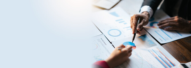 Business teamwork brainstorming meeting process. Business people discussing the charts and graphs...