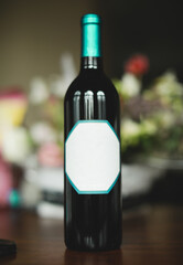 teal topped wine bottle with blank label for product mockup 