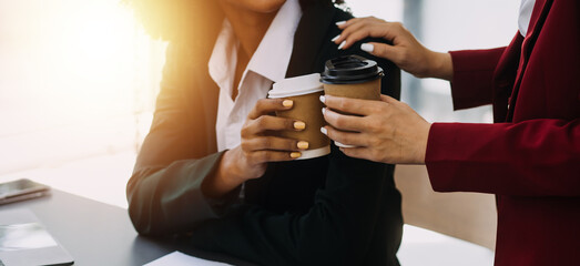Entrepreneurs and business people conference in modern meeting room, happy multiracial coworkers have fun cooperating working together at office meeting, asian teamwork concept
