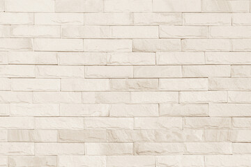 Cream and white brick wall texture background. Brickwork and stonework flooring interior rock old pattern design