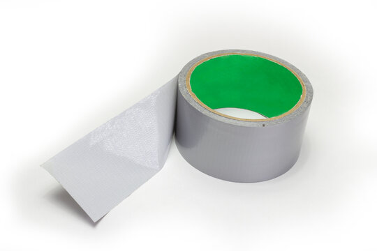 TPL tape consists of special glass fiber reinforced polyethylene basis with rubber adhesive coating. Waterproof reinforced adhesive tpl tape (duct), gray color with a metallic sheen, isolated image.