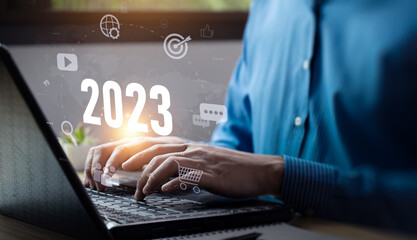 2023 business concept, Businessman showing online business trends and digital marketing, search engines, social media, email, and mobile devices, to promote and sell products or services. target group