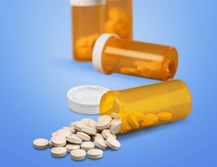 Medical pills in prescription drug plastic bottle